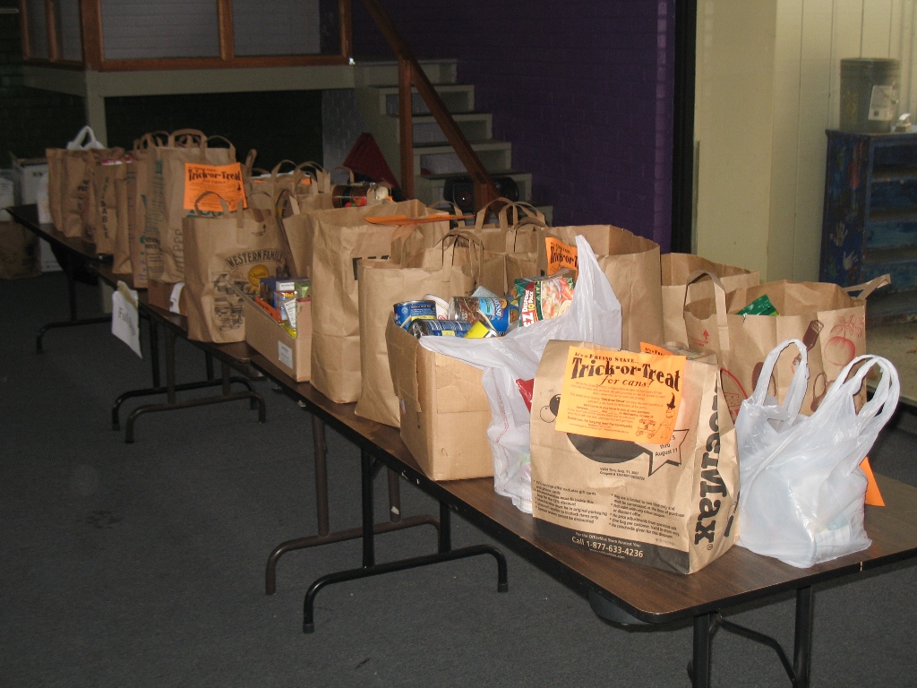 Just one table of cans collected from the event